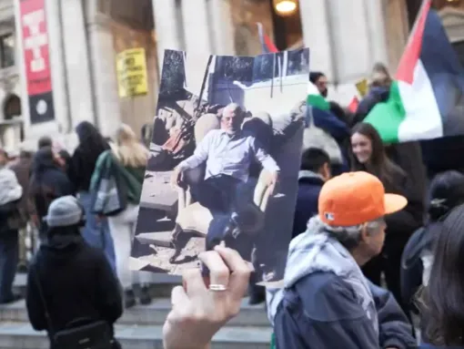 An anti-Israel protester displays a photograph of Hamas leader Yahya Sinwar in New York, NY, on October 18, 2024, two days after he was killed by Israeli military forces in Gaza.